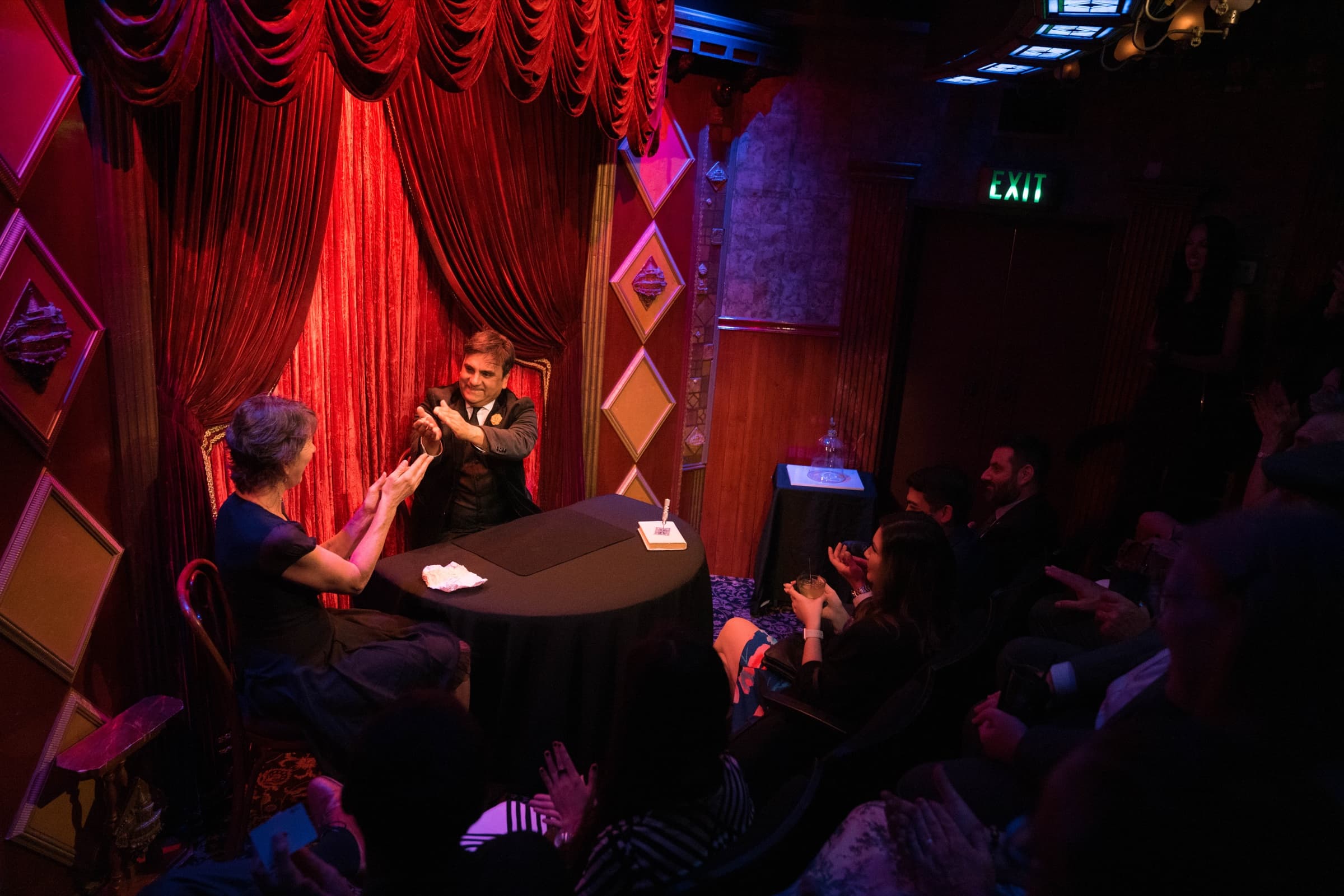 Luis Albornoz performs for the audience in the Magic Castle's Close-Up Gallery